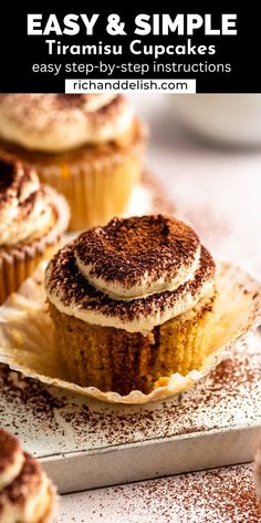 some cupcakes are on a plate with powdered sugar