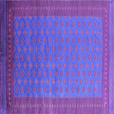 a purple and pink cloth with an intricate design