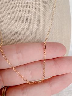 The PERFECT gold-filled layer. 14k gold fill material. Hangs at 16” - no extender. Water and tarnish resistant. 14k Gold Charm Necklaces With Adjustable Oval Link Chain, 14k Gold Oval Link Charm Necklaces With Adjustable Chain, 14k Gold Charm Necklace With Adjustable Oval Link Chain, Rose Gold Necklace With Delicate Chain And Rectangular Links, 14k Gold Filled Chain Link Necklace With Adjustable Chain, Rose Gold Chain Necklace With Adjustable Chain For Everyday, Rose Gold Adjustable Chain Necklace For Everyday, 14k Gold-filled Oval Link Necklaces, Gold 14k Cable Chain Charm Necklaces