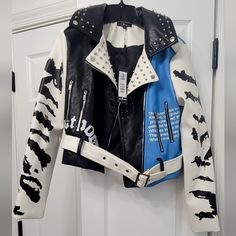 Women's Glam/Graphic Vegan Motorcycle Jacket. Never Worn. Pet And Smoke-Free Home. Black Blue And White Outfits, Punk Style Leather Jacket With Graphic Print, White Punk Outerwear For Winter, Edgy Leather Jacket With Graphic Print For Winter, Edgy Graphic Print Biker Jacket For Fall, Fitted Graphic Print Biker Jacket, Trendy Blue Outerwear With Graphic Print, Edgy Long Sleeve Biker Jacket With Graphic Print, Black Leather Jacket With Graphic Print For Fall