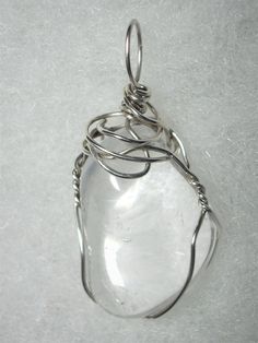 Clear Quartz Pendant Wire Wrapped .925 Sterling Silver Unique Clear Healing Crystals, Clear Healing Crystals, Handmade Elegant Silver Crystals, Clear Quartz Gemstone Crystals, Clear Glass Healing Jewelry, Clear Glass Jewelry For Healing, Elegant Silver Quartz Crystals, Wire Wrapped Silver Crystals For Healing, Silver Wire Wrapped Crystals For Jewelry Making