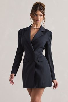 Take business casual to new heights with our premium blazer dress, State Of Mind. Crafted in a deep navy hue of our premium pinstripe, this tailored mini features subtle shoulder padding, peak lapels and a self-tie back for a cinched custom fit. For a sophisticated ensemble, pair yours with a simple pearl necklace and tousled bun.  Features - Premium pinstripe- Tailored fit - Peak lapels- Shoulder padding- Double breasted- Self-tie back- Mini length Sizing & Fit Model is 5'7 and wears UK size 8 / US size 4Product Information Designed exclusively by Club L London Lined with some stretch Premium woven fabric in Navy Pinstripe (67% Polyester, 30% Viscose, 3% Elastane)SKU: CL132312015 Simple Pearl Necklace, Blazer Mini Dress, Club L London, Black Dress Prom, Black Tie Gala, Simple Pearl, Party Dress Long Sleeve, Black Sequin Dress, Tailored Blazer