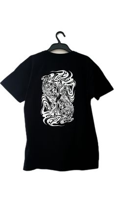 Send me a message with your desired design and size !  The perfect limited edition t-shirt for techno / rave / free party lovers who are looking for a unique piece for their rave outfits, but also for everyday life !  Their are 2 designs available : skull / soundsysteme on fire & "Free techno" / trippy symmetrical faces.  Their are 3 sizes available (varies depending on the design) : M / L / XL. The designs are hand screen printed on quality, 100% Coton black t-shirts. Very comfortable and styli Black Rave T-shirt With Screen Print, Black Y2k T-shirt With Custom Print, Black Rave Tops For Streetwear, Short Sleeve T-shirt With Sublimation Print For Festival, Black Cotton Rave T-shirt, Graphic Crew Neck T-shirt For Music Festival, Festival Graphic Crew Neck Top, Black Crew Neck T-shirt For Rave, Black Short Sleeve Rave Tops