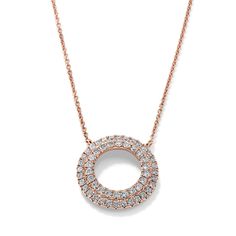 This 14-karat rose gold circle pendant makes a dazzling everyday accessory with two rows of natural diamond pavé. A lobster clasp keeps this beautiful necklace secure. Rose Gold Round Brilliant Cut Diamond Necklace, Dazzling Rose Gold Round Necklaces, Dazzling Rose Gold Round Necklace, Rose Gold Pave Setting Round Pendant Jewelry, Rose Gold Jewelry With Pave Setting In Round Pendant, Round Rose Gold Diamond Necklace In Fine Jewelry Style, Rose Gold Round Diamond Necklace In Fine Jewelry Style, Rose Gold Jewelry With Pave Setting Round Pendant, Rose Gold Round Diamond Necklace Fine Jewelry