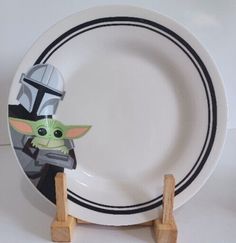 a plate with a star wars baby yoda on it