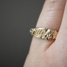 This vintage-inspired floral ring is a bouquet of sakura flowers wrapped around your fingers. Handmade and polished, it is available in 14K gold. The national flower of Japan, the cherry blossom - or Sakura, represents a time of renewal and optimism. They represent the ending of winter and signify the beginning of spring. Due to their quick blooming season, cherry blossoms also symbolize the transience of life, a major theme in Buddhism. This item is engravable with text or monogram of your choi Vintage Birth Flower Rings For Anniversary, Vintage 14k Gold Flower Ring, Vintage Flower Engraved Ring For Anniversary, Heirloom Wedding Rings With Birth Flower Detail, Heirloom Wedding Ring With Birth Flower, Vintage Yellow Gold Promise Flower Ring, Vintage Yellow Gold Flower Ring, Vintage Engraved Flower Wedding Ring, Vintage 14k Stamped Flower Ring For Wedding