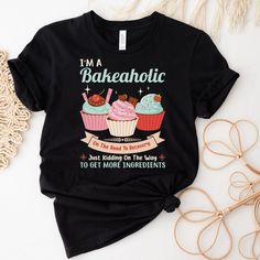 Unleash your baking prowess with this charming Cupcake Graphic T-Shirt! Featuring a vibrant cupcake graphic and a bold empowering phrase, this soft cotton tee is a must-have for baking enthusiasts. Perfect for casual outings, baking sessions, or as a thoughtful gift, this t-shirt combines style and passion. Order yours today and embrace the power of baking! Production Time:  2-5 business days (usually 2-3 days) Materials: ~Bella and Canvas 3001 Unisex Tshirt  ~100% Airlume combed and ringspun co Cupcake Graphic, Baker Gifts, Cupcake Shirt, Chef Shirt, Cupcake Queen, Baker Shirts, Chef Shirts, Cupcake Gift, Cake Business