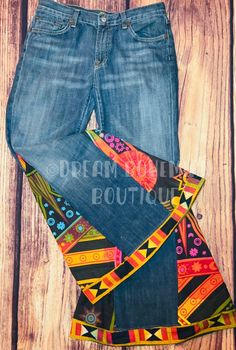 "These are called, \"Free Your Mind\" These jeans were created to assist with creativity, balance and spiritual freedom. Hippie style denim bellbottoms are a one of kind mandala print flare, bell bottom jeans. **UPCYCLED** All jeans used for this design are UPCYCLED (brands will vary) Below are the color meanings: The color orange means: optimism, emotion, adventure, creativity. Effects of orange: encouraging, enhances creativity. Orange represents the Free-Spirit The color orange represents the Casual Upcycled Dark Wash Bottoms, Multicolor Denim Bottoms For Festival, Medium Wash Cotton Bottoms For Festival, Dark Wash Cotton Bottoms For Festival, Festival Dark Wash Cotton Bottoms, Festival Cotton Bottoms In Dark Wash, Casual Dark Wash Upcycled Bottoms, Bohemian Straight Leg Recycled Denim Bottoms, Upcycled Blue Bottoms For Festivals