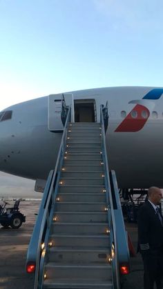 an airplane with stairs leading up to it