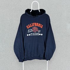 Size:  - Fits more like a Large (M on label)  Measurements:  - 24" pit to pit, 30" long  Condition:  - Excellent.  HH327 Mens Hoodies, Vintage California, Blue Hoodie, Tigers, Sweat Shirt, Hoodies Men, Active Wear, Mens Accessories, California