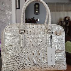 Brahmin Ivory And Silver Purse Luxury Beige Shoulder Bag With Crocodile Pattern, Elegant White Shoulder Bag With Crocodile Pattern, Elegant Gold Crocodile Pattern Bag, Elegant Silver Shoulder Bag With Crocodile Pattern, Elegant Silver Crocodile Pattern Shoulder Bag, Designer Gold Crocodile Pattern Bags, Silver Purse, Brahmin Bags, Cream Color