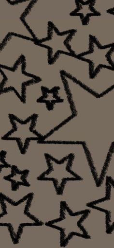 an abstract black and white background with stars in the middle, which appear to be drawn by hand