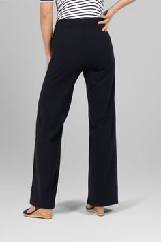 Why We Love This: Presenting our Natalie Sailor Pant —a harmonious blend of sophistication and versatility. Meticulously crafted with 4-way stretch fabric, this pull-on pant embodies effortless elegance and unparalleled comfort, elevating your style with every step. A modern twist on classic style, offering a flattering wide leg silhouette that elongates at every turn. Exude confidence and competence in our expertly designed work pants. Features: KiraGrace PowerStrong: Feels like cotton, keeps you dry High-rise, 32" inseam. Leg Opening: 23" Beautifully detailed gold button front Effortless elegant pull-on silhouette Made in USA of imported fabric Waist: High-Waisted (12" Rise) Inseam: 32" inseam, easy to hem Leg Shape: Wide leg pant Sizing: True to size Compression: Fitted through the hips Full Length 4-way Stretch Pants For Loungewear, Solid Straight Pants With 4-way Stretch, Elegant Wide-leg Pants With 4-way Stretch, Versatile Black Pull-on Pants, Elastane Wide-leg Loungewear Pants, Wide-leg Elastane Pants For Loungewear, Straight Leg Bottoms With Elastic Waistband And Minimal Stretch, Workwear Bottoms With Elastic Waistband And 4-way Stretch, Versatile Dress Pants With Elastic Waistband