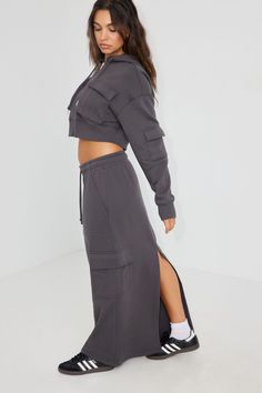 Okay but the sweat skirt though? I'm- Features - Drawstring at elasticized waistband - Side cargo pockets - Central slit at back hem - Fleece lining Size & Fit - Rise: Mid-rise - Length: Maxi - Model is wearing size S Materials & Care - Content: 65% cotton, 35% polyester - Care: Machine wash, cold - Imported Fleece Skirt, Garage Clothing, Next Clothes, Cargo Skirt, Gray Skirt, Bottom Clothes, Grey Hoodie, Skirt Outfits, Bottoms Pants