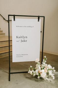 a sign that says welcome to the wedding of kaytyn and jake on it