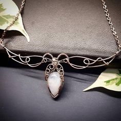 Hey, I found this really awesome Etsy listing at https://www.etsy.com/listing/772346352/elf-fairy-style-moonstone-necklace Handmade Ethereal White Necklace, Handmade White Ethereal Necklace, Ethereal Handmade White Necklace, Handmade Silver Moonstone Crystal Necklace, Nickel-free Silver Necklace With Copper Wire, Ethereal Handmade Moonstone Necklaces, Silver Copper Crystal Necklace As Gift, Mystical Silver Wire Wrapped Necklace, Mystical Silver-plated Copper Necklace