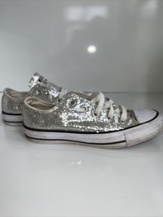 Converse Unisex CT All Star Ox 135851C Silver Glitter Shoes Sneaker Size M 4 W 6. Good condition, see photos. Casual Shimmer Sneakers With Round Toe, Casual Sequin Sneakers With Round Toe, Casual Metallic Sneakers With Glitter, Casual High-top Sparkling Sneakers, Casual Silver Sparkling Sneakers, Silver Sneakers With Glitter Print And Round Toe, Casual Sparkling High-top Sneakers, Casual Low-top Sparkling Sneakers, Party Low-top Sneakers