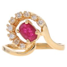 Size: 6 1/2 Sizing Fee: Up 3 sizes for $30 or Down 2 sizes for $30 Metal Content: 14k Yellow Gold Stone Information Natural Ruby Treatment: Heating Carat(s): .60ct Cut: Oval Color: Pinkish Red Natural Diamonds Carat(s): .14ctw Cut: Single Color: G - H Clarity: SI1 - SI2 Total Carats: 0.74ctw Style: Solitaire with Accents Measurements Face Height (north to south): 17/32" (13.1mm) Rise Above Finger: 7/32" (5.2mm) Weight: 3.0 Grams Stamps: 4k (partial), maker's mark Condition: Pre-Owned Professionally cleaned, polished, and tested to guarantee metal content. Ruby Diamond Ring, Ruby Diamond Rings, Pinkish Red, Rise Above, Gold Stone, Ruby Diamond, Maker's Mark, Natural Ruby, Cocktail Rings