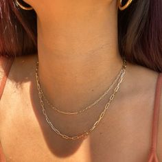 Introducing the Reema necklace – the perfect dainty and delicate piece for your layered necklace look. This necklace features a mini paperclip link chain design with an adjustable length so you can change it up each and every day. Simplicity and daintiness at its best with the Reema necklace! • Single Paperclip Chain• 18k Gold Filled• Chain Length: 18" + 1" extender (to make adjustable)• Link Chain Width: 1.8mm Minimalist Everyday Layered Link Necklace, Minimalist Link Layered Necklace For Everyday, Double Strand Paperclip Chain Layered Necklace, Everyday Double Strand Layered Necklace With Paperclip Chain, Trendy Layered Necklace With Paperclip Chain As Gift, Trendy Layered Necklace With Paperclip Chain For Gifts, Minimalist Double Chain Paperclip Jewelry, Minimalist Chain Link Layered Necklace, Trendy Everyday Charm Necklace With Paperclip Chain