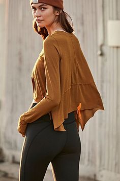 The perfect layer for all your workouts, this long-sleeve tee features a flowy, A-line silhouette with raw seam details and thumbholes at the sleeves. * Crewneck style * Lightweight design * Curved hemline | Tempo Long-Sleeve T-Shirt by FP Movement at Free People, High Atlas, XS Relaxed Fit Tops For Yoga In Fall, Relaxed Fit Yoga Tops For Fall, Fall Yoga Tops With Relaxed Fit, Fall Yoga Tops With Crew Neck, Fall Yoga Crew Neck Tops, Fall Stretch Long Sleeve Athleisure Top, Fall Stretch Long Sleeve Top In Athleisure Style, Fall Workout Tops With Crew Neck, Fall Workout Crew Neck Tops