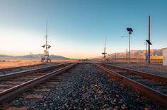 an empty train track in the middle of nowhere