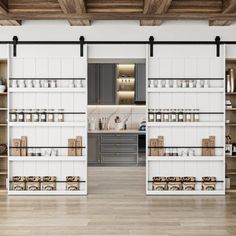 an open pantry with lots of bottles on the wall and shelves in front of it