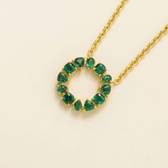 Glorie necklace in 18K gold vermeil set with ~5 carats Emerald. Chain length: 16-18 inches Pendant height is 2cm. Options available in 9K, 14K and 18K gold and additional sizes available, please contact Juvetti. Our precious jewellery is designed to preserve its original brilliance over time. There are a few precautions to make sure to keep your jewellery in the best condition.  Your jewellery should be cleaned regularly using clean and dry polishing cloth to gently rub your piece in one directi Emerald Chain, Emerald Set, Drop Pendant Necklace, Circle Pendant Necklace, Gold Necklace Set, Emerald Necklace, Emerald Gemstone, Precious Jewelry, Circle Pendant