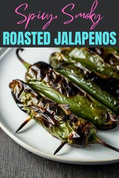 grilled jalapenos on a white plate with the words spring, smoky roasted jalapenos