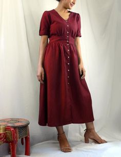 Maroon linen maxi dress, Button down dress, Custom made, Made to order, Plus size-Model height: 5'3" wearing size S-Length: 46"-Fit: Comfortable-100% Cotton-Coconut Buttons**Note: Free Shipping time 15-21 days. Express Shipping time 5-7 days.** Bohemian Pants, Dress Wine, Soft Autumn, Linen Maxi Dress, Button Down Dress, Button Dress, Linen Clothes, 21 Days, Plus Size Dress