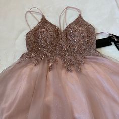 Perfect For Any Big Party Formal Sequin Spaghetti Strap Dress For Party Season, Formal Sequin Dress With Spaghetti Straps For Party Season, Elegant Spring Sequin Dress For Homecoming, Champagne Dress For Homecoming Party Season, Champagne Dress For Homecoming And Party Season, Elegant Pink Sequin Dress For Homecoming, Pink Sequin Dress For Party Season, Champagne Embellished Homecoming Dress, Champagne Spaghetti Strap Party Dress