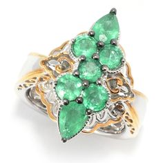 A marquise cluster ring like this can be the focal point of your marquee look. Seven Belmont emeralds set with black rhodium prongs fill in the top of this marquise shaped north to south ring. You'll fall in love with the polished shank with two-tone scrollwork decorating the side gallery and heart shaped cut-outs at the undergallery. Fine Jewelry Marquise Emerald Ring, Marquise Emerald Ring Fine Jewelry, Marquise Emerald Ring With Prong Setting, Green Marquise Emerald Ring With Accent Stones, Witcher Geralt, Mens Gold Jewelry, Italian Jewelry, Coin Jewelry, White Mark