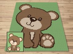 a cross stitch teddy bear with the words cut teddy bear on it's chest