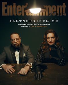 an advertisement for entertainment magazine featuring two people sitting at a table in front of a black background