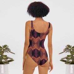 Indulge in the exquisite beauty of our African Print Bathing Suits One Piece. Made with vibrant African prints, this bathing suit will make you stand out in any pool or beach setting. The one-piece design provides optimal coverage and comfort, while the intricate patterns add a touch of culture and elegance. Elevate your swimwear collection with this exclusive piece. Product Features Please Compare your Measurements To our Size Chart Before Purchase • 82% Polyester, 18% Spandex• Fabric weight: 6 Fitted Multicolor One-piece For Sunbathing, Multicolor Printed One Piece For Beach Party, Multicolor Sleeveless One Pieces For The Beach, Multicolor Sleeveless One Pieces For Beach, Sleeveless Multicolor One Pieces For Beach, Multicolor Printed One-piece For Poolside, Summer Swimwear With Bold Print For Sunbathing, Multicolor Sleeveless One-piece For Beach Season, Multicolor Sleeveless One Piece For Beach Season