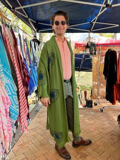 Our boho kimono/robes are super soft, fluffy and breathable. They are made of hand woven muslin fabric and prints are handcrafted with natural dyes, making the Boho Kimono gentle on your skin and the environment.  Super comfortable and styles beautifully on many body types. Great everyday piece, perfect to throw on at home or outside--also great as beach wear. 😊Both men and women love to buy this for indoors and outdoor concerts and festivals! our kimono robes are gender-neutral. Dries very quickly, soft and light and very absorbent.  🦚Made of %100 Natural Cotton - OEKO-TEX certified 🦚Wood block printed 🦚Eco friendly Loose style and fits most sizes ( S-M-L-XL-XXL). It comes with a belt (belt length varies between 58-60 inches).  🦒Please pay attention to the kimono type sleeves, it's r One Size Cotton Festival Kimono, Cotton One Size Festival Kimono, One Size Cotton Kimono For Festivals, Cotton Festival Kimono One Size, Traditional One Size Kimono For Summer, Green Bohemian Summer Outerwear, Traditional Open Front Summer Robe, Hippie Long Green Kimono, Green One-size Festival Kimono