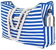 a large blue and white striped tote bag with a bottle in the front pocket