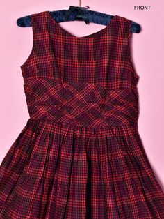 "🌸 RED PLAID SUN DRESS ------------------------------------------- Vintage cotton red & black dress from the 40's - 50's. Side metal red zipper, unlined. NO SIGNS IT WAS EVER USED. It's a small size. Unlined. Rich red & black colors.It has a slight deep red/purple on part of the design. 🌼I have LAY-A-WAY! - just ask CONDITION: Near Mint. No signs it was ever used. Still has paper tag. Hand washed in organic soap. LABEL: None SIZE: Small or XS BUST: 32\" - Fabric measures 16\" across wh Red Black Dress, Organic Soap, Dress Purple, Sun Dress, Vintage Wear, Vintage Cotton, Dress Vintage, Full Skirt, Costume Design