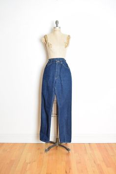 Description:This is a cool pair of vintage Lee jeans from the late 70s. They're made of heavy-weight cotton denim that has a dark wash and gold contrast stitching. These jeans have a high waist, straight legs, and they close with a zipper fly.Excellent conditionLabel: LeeMeasurements:These jeans fit like a size medium, but please go by the measurements.Chest:Waist: 28"Hips: 39"Total length: 43"Front rise: 12.5"Sleeve length:Shoulder to shoulder:Inseam: 31"Clipped back in photos?: noSize on tag: Vintage High Waist Flare Jeans In Rigid Denim, Vintage High Waist Rigid Denim Flare Jeans, Retro High Waist Dark Wash Pants, Vintage High Waist Rigid Denim Bottoms, Vintage High-waist Rigid Denim Bottoms, Vintage Dark Wash Tapered Leg Jeans, Vintage High Waist Rigid Denim Jeans, Vintage Tapered Leg Dark Wash Jeans, Vintage Straight Dark Wash Bottoms