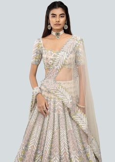 Alabaster applique and embellished heavy kali mirror work net lehenga with broad lehenga border, blouse and broad border net dupatta. Reception Lehenga In Off White With Sheer Dupatta, Off White Lehenga With Sheer Dupatta For Reception, Festive Off White Choli With Sheer Dupatta, Designer White Lehenga With Sheer Dupatta, White Anarkali Pre-draped Saree With Intricate Embroidery, Festive Off-white Choli With Sheer Dupatta, White Kundan Lehenga For Party, Off White Lehenga With Sheer Dupatta For Navratri, Off White Lehenga With Sheer Dupatta For Festive Occasions