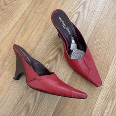 Gorgeous Vintage Red Leather Heel Mules By Stephane Klian Paris, A French Luxury Brand (Stephane Worked For Issey Miyake And Jean Paul Gaultier In The 80s). Geometric Stitching With Semi Wedge Heel. Very 90s And Sleek And Minimal. Normal Wear. Made In France Size Marked 3.5 - Fits Like A Us 6 Or 6.5 Heel Height Around 3.5" Red Slip-on Heels With Removable Insole, Evening Slip-on Heels With Leather Lining, Burgundy Leather Heels For Spring, Red Leather Heels With Padded Heel, Red Fitted Slip-on Heels, Leather Slip-on Heels With Red Sole, Burgundy Leather Heels With Pointed Toe, Red Slip-on Fitted Heels, Elegant Red Square Toe Heels