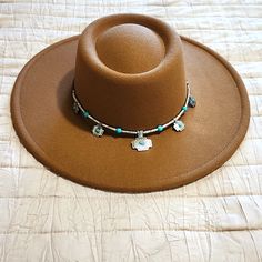 Womens Western Felt Pork Pie Hat New With Tags. Color Is Brown With Faux Leather Hat Band, Hat Band Has Faux Silver Crosses With Silver Beads And Faux Turquoise. Measurements Are 22" Inside Circumference With An Adjustable Strap On The Inside Of The Band To Make The Hat Fit Tighter Or Smaller If Needed. Crown Is 4" Tall And Brim Measures 4" From Crown To Edge Of Brim Around. Beautiful Western Hat Can Wear With Anything!! You'll Love It!! Pork Pie Hat, Western Hat, Pork Pie, Leather Hat, Western Hats, Leather Hats, Hat Band, Silver Cross, Silver Beads