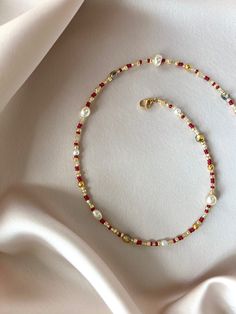 Gold Round Beads Choker As Gift, Adjustable Beaded Chain Necklaces For Festive Occasions, Red Beaded Jewelry For Gifts, Gold Choker With Round Beads As Gift, Adjustable Beaded Necklaces For Festive Occasions, Red Jewelry With Colorful Beads For Gift, Gift Red Jewelry With Colorful Beads, Gold Faceted Beads Choker As Gift, Gold Beaded Bracelets For Holiday