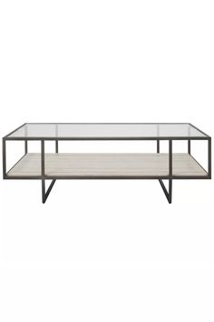 a glass and metal coffee table with shelves on the bottom, in front of a white background