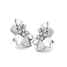 Platinum Earrings by Jewelove Platinum Earrings with petals of platinum stamen of diamonds. The petals are alternating matte finish hi-polish. Metal : Platinum Platinum Purity : 95% Purity Mark : Pt 950 Gemstone : Natural Diamonds Certificate of Authenticity : Platinum Guild International P.S. : You can select to order the Earrings Only, Pendant Only or Both from the options above. Diamond Grading Report : SGL Silver Flower Diamond Earrings For Formal Occasions, Formal White Gold Flower Earrings, Classic Silver Flower Shaped Diamond Earrings, White Gold Flower Earrings With Diamond Accents For Wedding, Elegant Flower Shaped White Gold Diamond Earrings, Formal White Gold Flower Earrings With Diamond Accents, Elegant Silver Flower Earrings With Prong Setting, Formal Silver Flower Earrings With Diamond Accents, Silver Flower Earrings With Diamond Accents For Formal Occasions