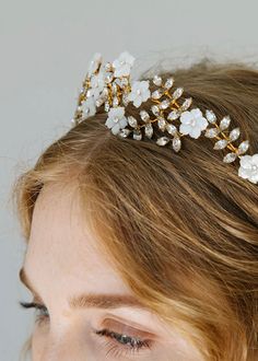 Consider your wow-factor secured: The Vivienne Tiara beautifully combines vines of hand-set Swarovski crystals, with delicate hand-carved mother of pearl flowers. The sparkle of the crystals is amplified by the shimmering mother of pearl, creating a truly unforgettable moment. This tiara is finished in the back with a ribbon tie for a secure fit. Dimensions: 2in crown Weight: 43g Villa Woodbine Wedding, Villa Woodbine, Wedding Aesthetics, Luxury Hair Accessories, Pearl Flowers, Jennifer Behr, The Vivienne, Crystal Tiaras, Luxury Hair