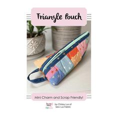 the triangle pouch is made from multicolored fabric