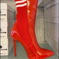 Size 8 Red High Heel Winter Boots, Red Ankle Boots For Winter, Winter Boots With Red Sole In Synthetic Material, Bold High-top Boots For Fall, Fitted Bold Winter Boots, Trendy High Ankle Boots With Red Sole, Casual Boots With Red Sole For Spring, Red Round Toe Heels For Fall, Chic Red Winter Boots