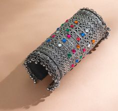 Our Indian bangle is created with careful attention to detail. The finishing gives it an elegant look & Feel. This design is perfect for parties & functions as these bangles/handcuffs are specially designed for Indian beautiful brides. -Base Metal- Alloy, Silver, Brass -Plating- Silver -Stone- Pearls, Beads & sequin -Sizing- Free Size & adjustable -Type- Bangles -Light Weight -FREE Shipping -Gift Wrapping Available -Delivery from a Small Business in India -Handmade Product Skin Friendly - Lead & Rajasthani Jewellery, Bangle Silver, Bangles Indian, Jewelry Safe, Silver Bangle, Bracelet Argent, Silver Bangles, Base Metal, Arm Band