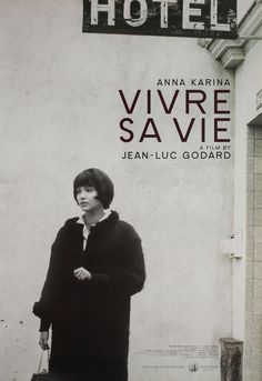 a woman standing in front of a building with a sign above her head that says hotel vivre savie