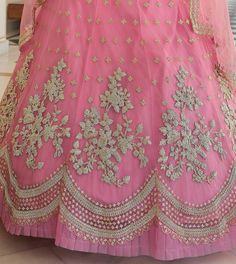 COLOR : Shimmering Blush Pink FABRIC : Top (Blouse) - Soft Net, Bottom (Lehenga) - Soft Net, Dupatta - Soft Net WORK : Heavy Metallic Thread Embroidery, Zari Work, Cutwork, Sequins, Motifs, Lace Border OCCASION : Wedding, Reception, Sangeet, Engagement READY-TO-WEAR : NoSTITCHING : Available as semi-stitched fabric, can be stitched using standard size option (+$30). Note: There might be a slight color variation due to lighting and flash used during photoshoot. The bright shade seen is the best c Ceremonial Semi-stitched Zari Work Choli, Ceremony Gown With Saree Shape And Intricate Embroidery, Bollywood Gown With Sheer Dupatta For Ceremony, Bollywood Style Gown With Sheer Dupatta For Ceremonies, Pink Traditional Wear With Zari Work For Wedding, Ceremonial Saree Dress With Zari Work, Semi-stitched Gown With Sheer Dupatta For Ceremony, Gown With Dupatta In Saree Style For Ceremony, Semi-stitched Bollywood Saree For Ceremony